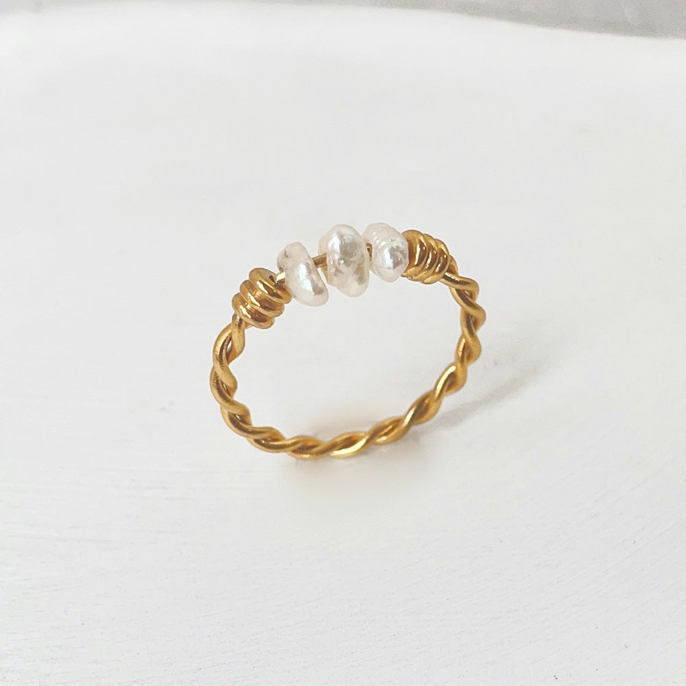 Anillo de acero de titanio de perla natural de giro al por mayor